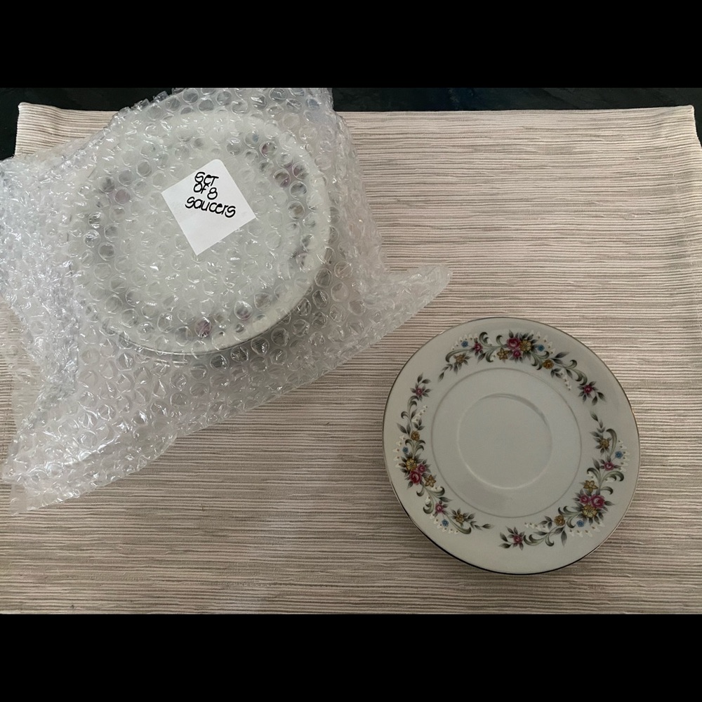 Tea Cup Saucers with Floral Designs